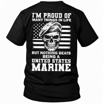 Back view of a black Being A Marine custom year veteran T-shirt with Beret skull on distressed American flag