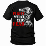 Back view of a black We Fight What You Fear custom year veteran T-shirt with a helmeted skull soldier and stencil lettering