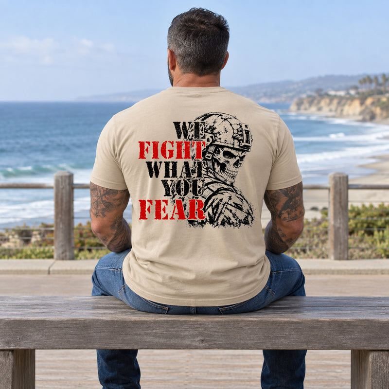 Man wearing a sand We Fight What You Fear custom year veteran T-shirt, back print view