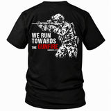 Back view of a black We Run Towards the Gunfire custom year veteran T-shirt